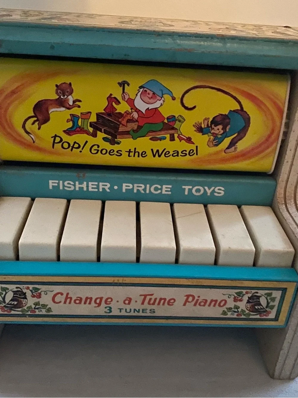 Fisher-Price Change-a-Tune Piano in Teal, Yellow and White
